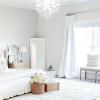 imageNICETOWN 100 Blackout Window Curtain Panels Cold and Full Light Blocking Drapes with Black Liner for Nursery 84 Inches Drop Thermal Insulated Draperies Pure White 2 Pieces 52 inches WidePure White