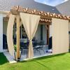 image:imageNICETOWN 2 Panels RodFree Outdoor Curtains for Patio Waterproof Sticky Top amp Back Tab Bottom with Free Rope for Wind Resistance Weatherproof Drapes for GazeboPorch W52 x L84 in Biscotti BeigeBiscotti Beige